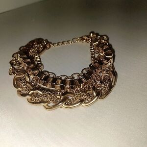 Goldtone multi chain bracelet